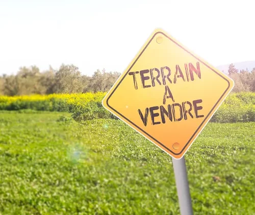 Pancarte trouver un terrain à acheter
